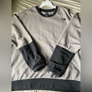 north face crewneck with black windbreaker material